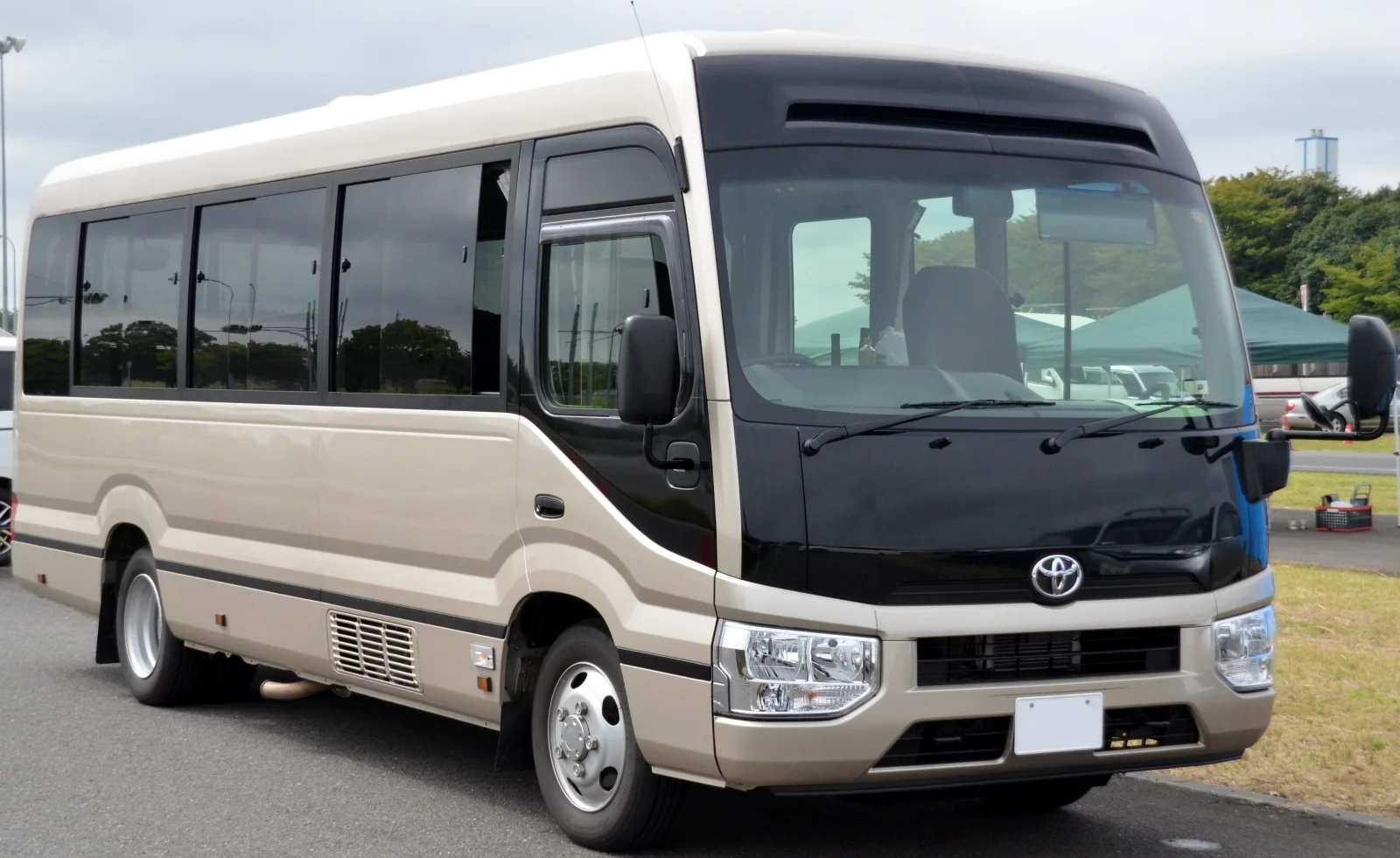 Toyota Coaster 22-seater luxury mini bus for group transport Lahore